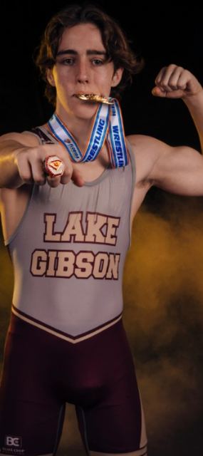 Example of the Bite the Medal pose