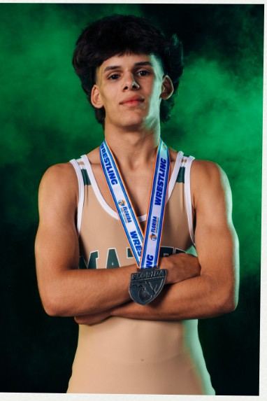 Example of the Bite the Medal pose